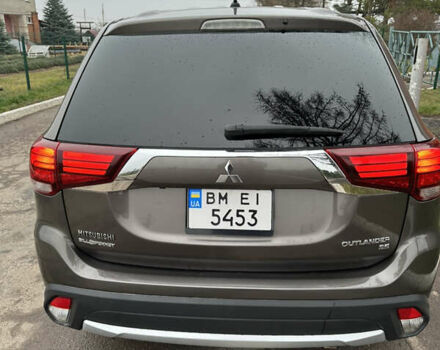 Коричневий Міцубісі Аутлендер, об'ємом двигуна 2.36 л та пробігом 197 тис. км за 14000 $, фото 10 на Automoto.ua