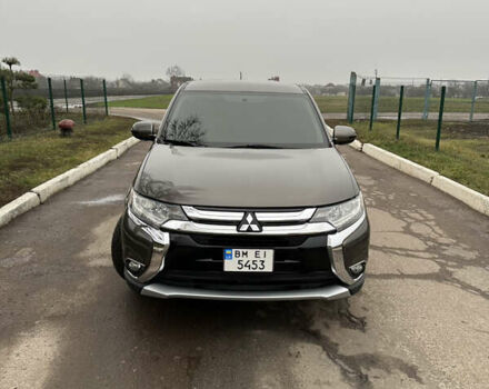 Коричневий Міцубісі Аутлендер, об'ємом двигуна 2.36 л та пробігом 197 тис. км за 14000 $, фото 3 на Automoto.ua
