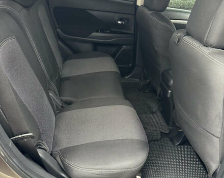 Коричневий Міцубісі Аутлендер, об'ємом двигуна 2.36 л та пробігом 197 тис. км за 14000 $, фото 13 на Automoto.ua