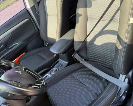 Коричневий Міцубісі Аутлендер, об'ємом двигуна 2.36 л та пробігом 128 тис. км за 15500 $, фото 3 на Automoto.ua