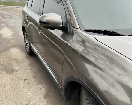 Коричневий Міцубісі Аутлендер, об'ємом двигуна 2.36 л та пробігом 197 тис. км за 14000 $, фото 1 на Automoto.ua