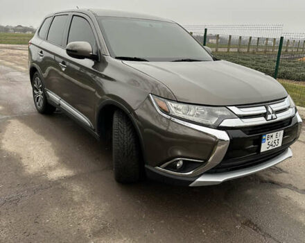 Коричневий Міцубісі Аутлендер, об'ємом двигуна 2.36 л та пробігом 197 тис. км за 14000 $, фото 4 на Automoto.ua