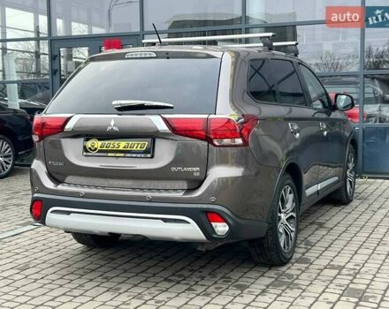 Коричневый Мицубиси Аутлендер, объемом двигателя 2.36 л и пробегом 160 тыс. км за 15000 $, фото 6 на Automoto.ua