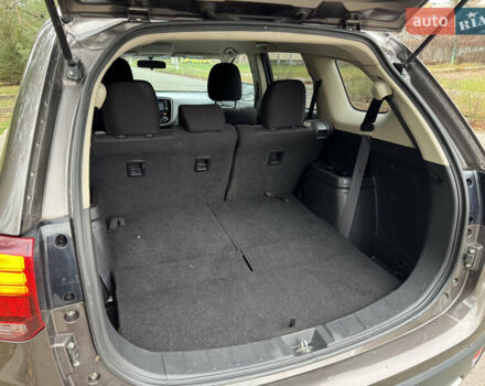 Коричневий Міцубісі Аутлендер, об'ємом двигуна 2.36 л та пробігом 167 тис. км за 12500 $, фото 10 на Automoto.ua