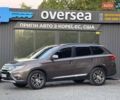 Коричневый Мицубиси Аутлендер, объемом двигателя 2.36 л и пробегом 208 тыс. км за 13900 $, фото 1 на Automoto.ua