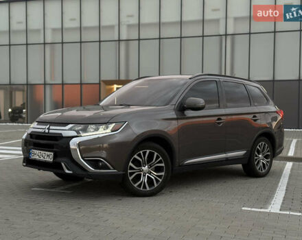 Коричневый Мицубиси Аутлендер, объемом двигателя 2.36 л и пробегом 188 тыс. км за 13000 $, фото 1 на Automoto.ua