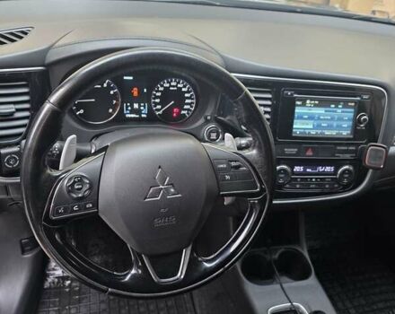 Коричневий Міцубісі Аутлендер, об'ємом двигуна 2.36 л та пробігом 176 тис. км за 15800 $, фото 1 на Automoto.ua