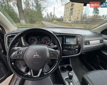 Коричневий Міцубісі Аутлендер, об'ємом двигуна 2.36 л та пробігом 167 тис. км за 12500 $, фото 3 на Automoto.ua