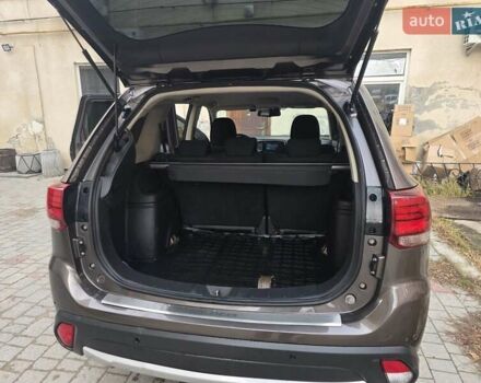 Коричневий Міцубісі Аутлендер, об'ємом двигуна 2.36 л та пробігом 176 тис. км за 15800 $, фото 6 на Automoto.ua