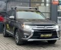 Коричневый Мицубиси Аутлендер, объемом двигателя 2.36 л и пробегом 160 тыс. км за 15000 $, фото 1 на Automoto.ua