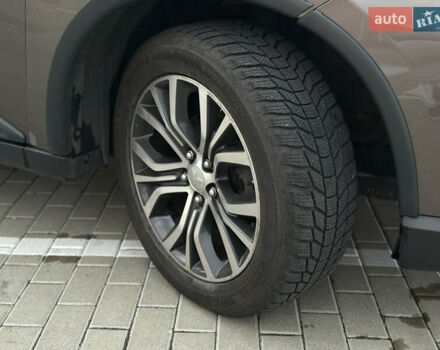 Коричневый Мицубиси Аутлендер, объемом двигателя 2.36 л и пробегом 188 тыс. км за 13000 $, фото 9 на Automoto.ua