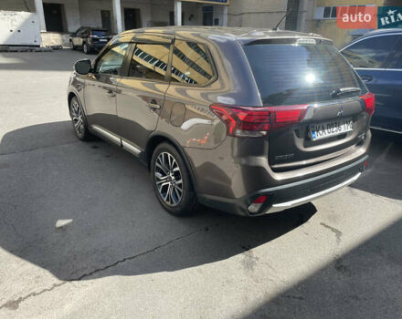 Коричневий Міцубісі Аутлендер, об'ємом двигуна 2.36 л та пробігом 200 тис. км за 14000 $, фото 3 на Automoto.ua