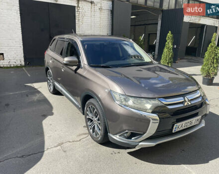 Коричневий Міцубісі Аутлендер, об'ємом двигуна 2.36 л та пробігом 200 тис. км за 14000 $, фото 1 на Automoto.ua