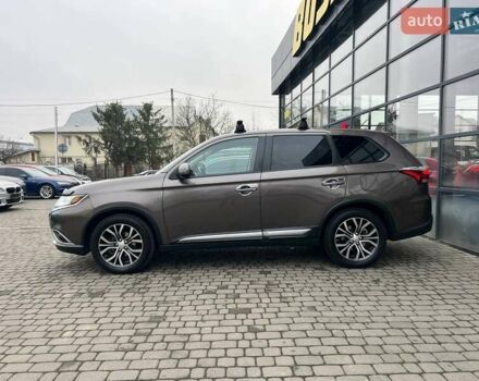 Коричневый Мицубиси Аутлендер, объемом двигателя 2.36 л и пробегом 160 тыс. км за 15000 $, фото 3 на Automoto.ua