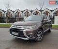 Коричневий Міцубісі Аутлендер, об'ємом двигуна 2.36 л та пробігом 167 тис. км за 13500 $, фото 1 на Automoto.ua