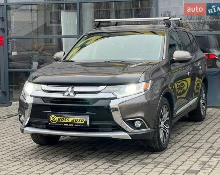 Коричневый Мицубиси Аутлендер, объемом двигателя 2.36 л и пробегом 160 тыс. км за 15000 $, фото 2 на Automoto.ua