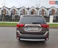 Коричневий Міцубісі Аутлендер, об'ємом двигуна 2.36 л та пробігом 167 тис. км за 13500 $, фото 5 на Automoto.ua