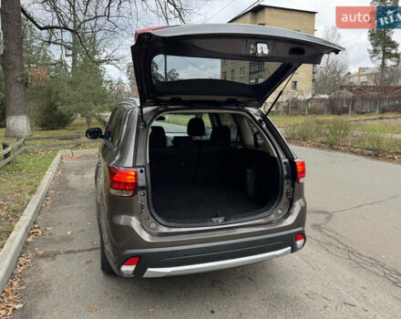 Коричневий Міцубісі Аутлендер, об'ємом двигуна 2.36 л та пробігом 167 тис. км за 12500 $, фото 12 на Automoto.ua