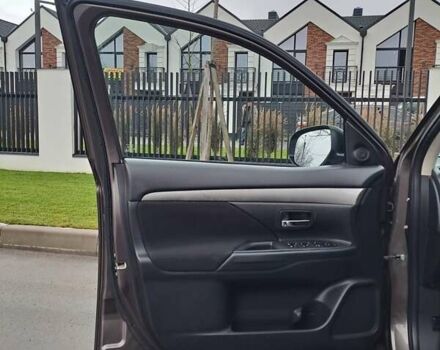 Коричневий Міцубісі Аутлендер, об'ємом двигуна 2.36 л та пробігом 167 тис. км за 13500 $, фото 10 на Automoto.ua