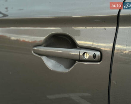 Коричневый Мицубиси Аутлендер, объемом двигателя 2.36 л и пробегом 188 тыс. км за 13000 $, фото 10 на Automoto.ua