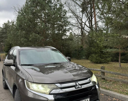 Коричневий Міцубісі Аутлендер, об'ємом двигуна 2.36 л та пробігом 167 тис. км за 12500 $, фото 1 на Automoto.ua