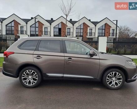 Коричневий Міцубісі Аутлендер, об'ємом двигуна 2.36 л та пробігом 167 тис. км за 13500 $, фото 8 на Automoto.ua