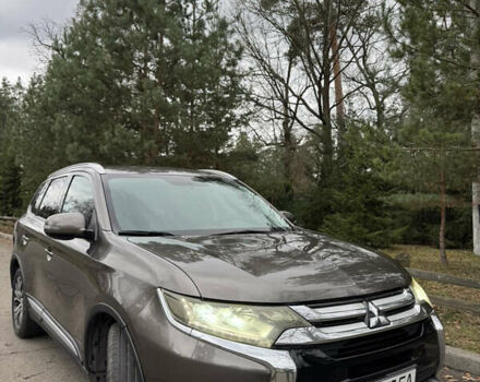 Коричневий Міцубісі Аутлендер, об'ємом двигуна 2.36 л та пробігом 167 тис. км за 12500 $, фото 2 на Automoto.ua