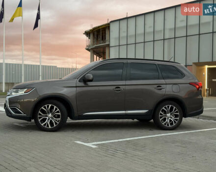 Коричневый Мицубиси Аутлендер, объемом двигателя 2.36 л и пробегом 188 тыс. км за 13000 $, фото 3 на Automoto.ua