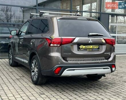 Коричневый Мицубиси Аутлендер, объемом двигателя 2.36 л и пробегом 160 тыс. км за 15000 $, фото 4 на Automoto.ua