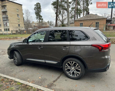 Коричневий Міцубісі Аутлендер, об'ємом двигуна 2.36 л та пробігом 167 тис. км за 12500 $, фото 17 на Automoto.ua