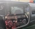 Коричневый Мицубиси Аутлендер, объемом двигателя 2.36 л и пробегом 128 тыс. км за 14500 $, фото 1 на Automoto.ua