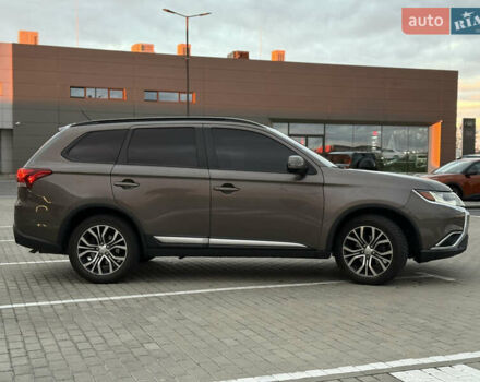 Коричневый Мицубиси Аутлендер, объемом двигателя 2.36 л и пробегом 188 тыс. км за 13000 $, фото 4 на Automoto.ua