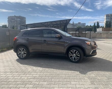 Коричневый Мицубиси Аутлендер, объемом двигателя 2 л и пробегом 210 тыс. км за 12500 $, фото 4 на Automoto.ua