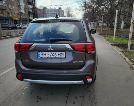 Коричневый Мицубиси Аутлендер, объемом двигателя 2.36 л и пробегом 84 тыс. км за 17500 $, фото 1 на Automoto.ua