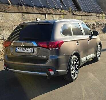 Коричневый Мицубиси Аутлендер, объемом двигателя 2.36 л и пробегом 168 тыс. км за 16500 $, фото 7 на Automoto.ua