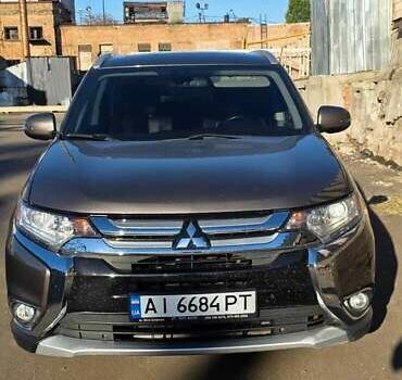 Коричневый Мицубиси Аутлендер, объемом двигателя 2.36 л и пробегом 168 тыс. км за 16500 $, фото 1 на Automoto.ua