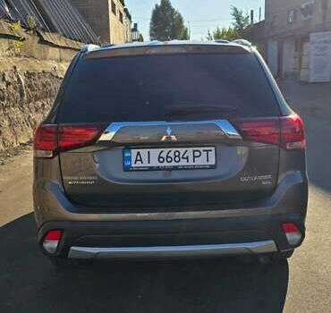 Коричневый Мицубиси Аутлендер, объемом двигателя 2.36 л и пробегом 168 тыс. км за 16500 $, фото 5 на Automoto.ua