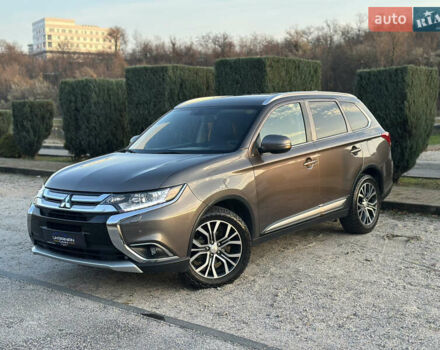 Коричневый Мицубиси Аутлендер, объемом двигателя 2.36 л и пробегом 115 тыс. км за 15500 $, фото 1 на Automoto.ua