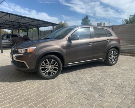 Коричневый Мицубиси Аутлендер, объемом двигателя 2 л и пробегом 210 тыс. км за 12500 $, фото 2 на Automoto.ua