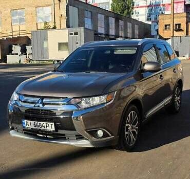 Коричневый Мицубиси Аутлендер, объемом двигателя 2.36 л и пробегом 168 тыс. км за 16500 $, фото 4 на Automoto.ua