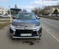 Коричневый Мицубиси Аутлендер, объемом двигателя 2.36 л и пробегом 84 тыс. км за 17500 $, фото 1 на Automoto.ua