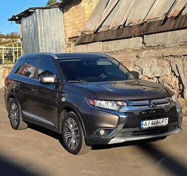 Коричневый Мицубиси Аутлендер, объемом двигателя 2.36 л и пробегом 168 тыс. км за 16500 $, фото 2 на Automoto.ua