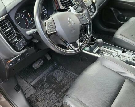 Коричневый Мицубиси Аутлендер, объемом двигателя 2.36 л и пробегом 84 тыс. км за 17500 $, фото 5 на Automoto.ua