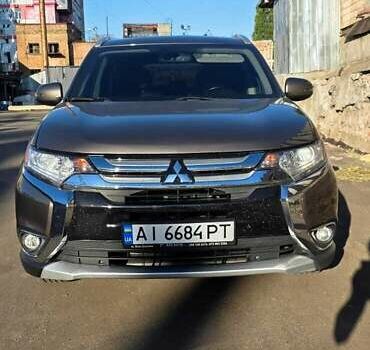 Коричневый Мицубиси Аутлендер, объемом двигателя 2.36 л и пробегом 168 тыс. км за 16500 $, фото 3 на Automoto.ua