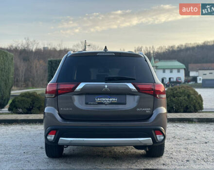 Коричневый Мицубиси Аутлендер, объемом двигателя 2.36 л и пробегом 115 тыс. км за 15500 $, фото 8 на Automoto.ua