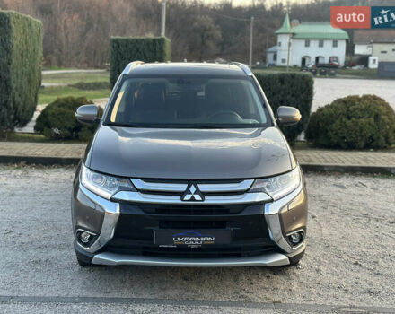 Коричневый Мицубиси Аутлендер, объемом двигателя 2.36 л и пробегом 115 тыс. км за 15500 $, фото 2 на Automoto.ua