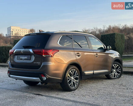 Коричневый Мицубиси Аутлендер, объемом двигателя 2.36 л и пробегом 115 тыс. км за 15500 $, фото 6 на Automoto.ua