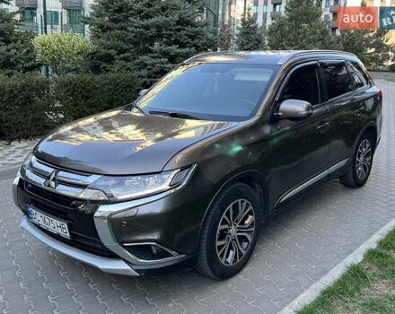 Коричневий Міцубісі Аутлендер, об'ємом двигуна 2.36 л та пробігом 170 тис. км за 16500 $, фото 2 на Automoto.ua