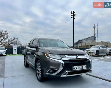 Коричневый Мицубиси Аутлендер, объемом двигателя 2.4 л и пробегом 192 тыс. км за 19500 $, фото 4 на Automoto.ua