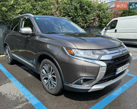 Коричневый Мицубиси Аутлендер, объемом двигателя 2.36 л и пробегом 185 тыс. км за 17670 $, фото 4 на Automoto.ua